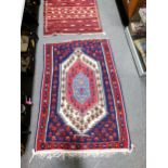 Kilim flat weave rug and another, similar