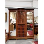 Edwardian mahogany inlaid two-piece bedroom suite, comprising a triple combination wardrobe and