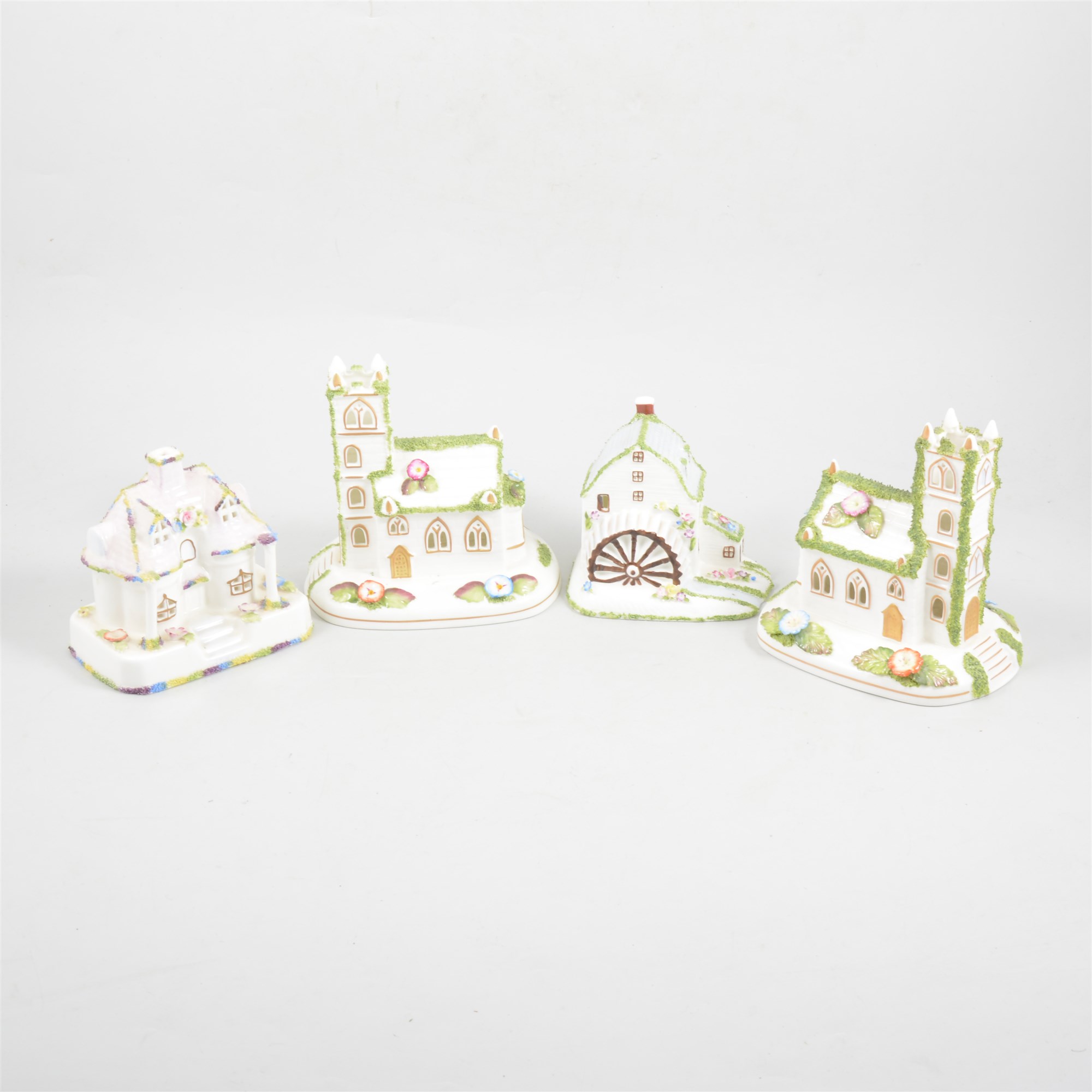 A collection of thirteen Modern Coalport cottages.