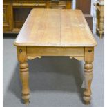 A large kitchen table, sycamore top, pine supports