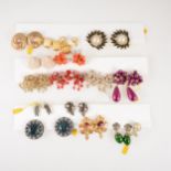 Twenty-nine pairs of vintage clip on costume jewellery earrings, coloured and clear paste stones,