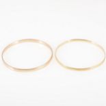 Two 9 carat yellow gold slave bangles, 3.8mm and 4.8mm wide, 67mm internal diameter, total weight