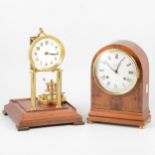 A 400 day anniversary clock, and a reproduction mantel clock by Comitti of London, yew wood case.