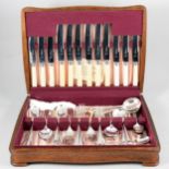 A canteen of silver plated cutlery, oak case.