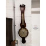 A Regency inlaid mahogany banjo shaped wall barometer,