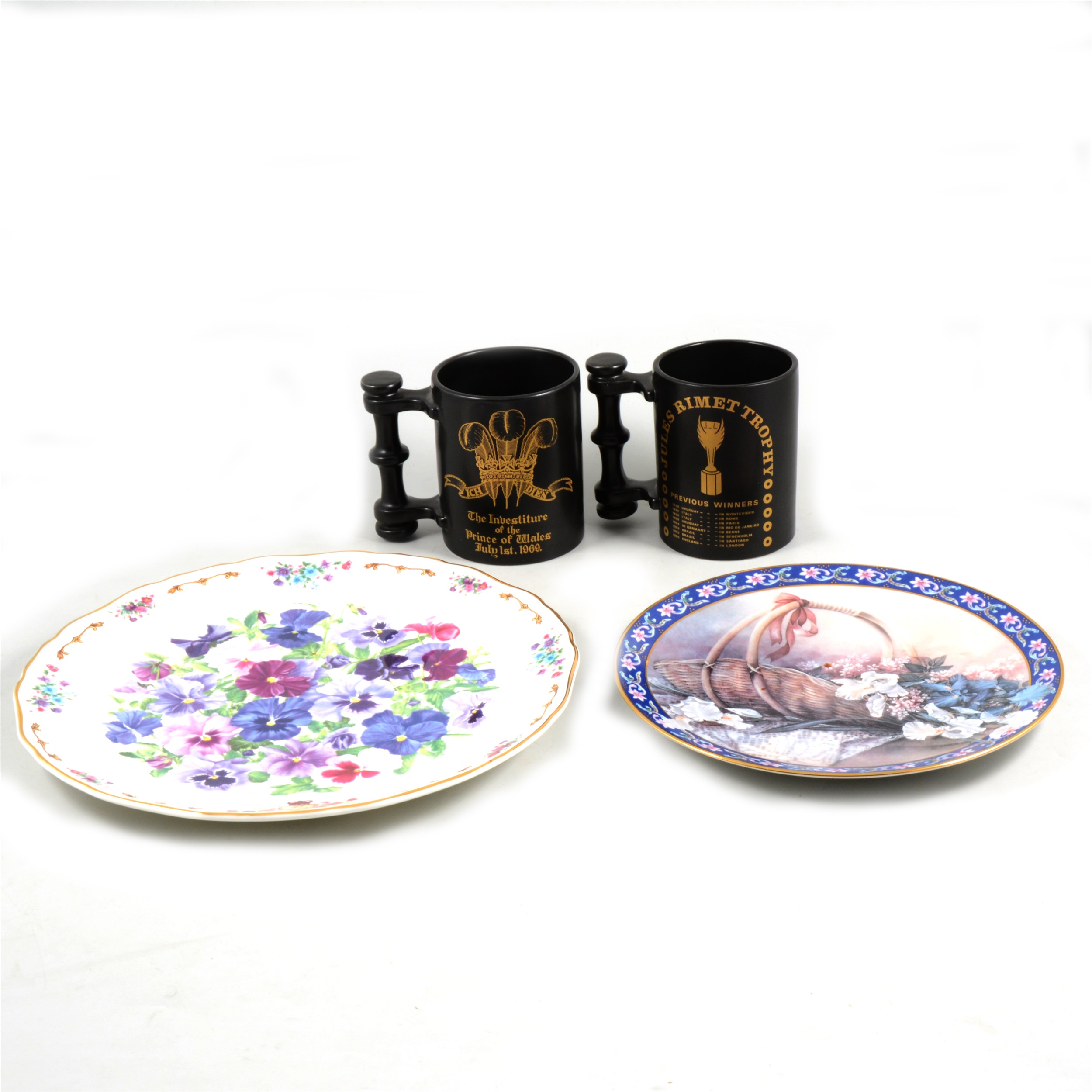 Two sets of four limited edition plates and four Portmeirion mugs