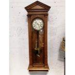 A Vienna type wall clock, later oak "regulator" case,