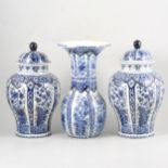 A pair of Delft pattern covered vases by Boch, a similar vase, and other ceramics.