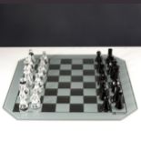 Swarovski Crystal chess set and board, both boxed.