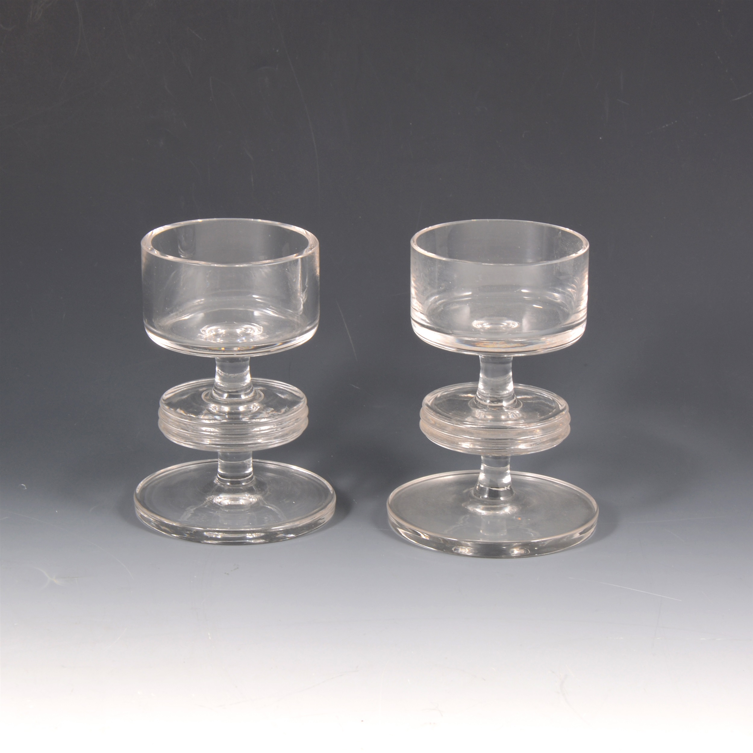 A pair of Wedgwood clear glass candlesticks, Kings Lynn pattern.