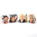 A collection of Royal Doulton figurines and character jugs.