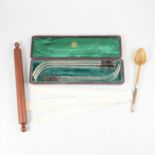 A horn and white metal mounted spoon, Eyre & Spottiswoode draughtsman's set of cardboard scales,