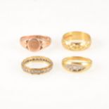 Four gold rings, an 18 carat yellow gold 5.8mm wide diamond cut wedding band, approximate weight