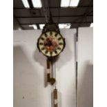 A modern dial clock, ceramic centre printed with a bucolic scene,