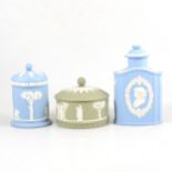 A Wedgwood Jasperware tea caddy and two covered boxes.