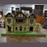 Painted dolls house, labelled Amersham Toys, ...