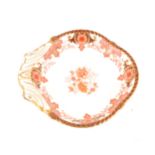 A Royal Crown Derby porcelain dessert dish, puce floral decoration with gilded highlights, date