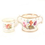 A Worcester porcelain twin handled mug hand painted with flowers and gilt highlights, 12.5cm high,