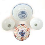 A Chinese blue and white rice-decorated rose bowl