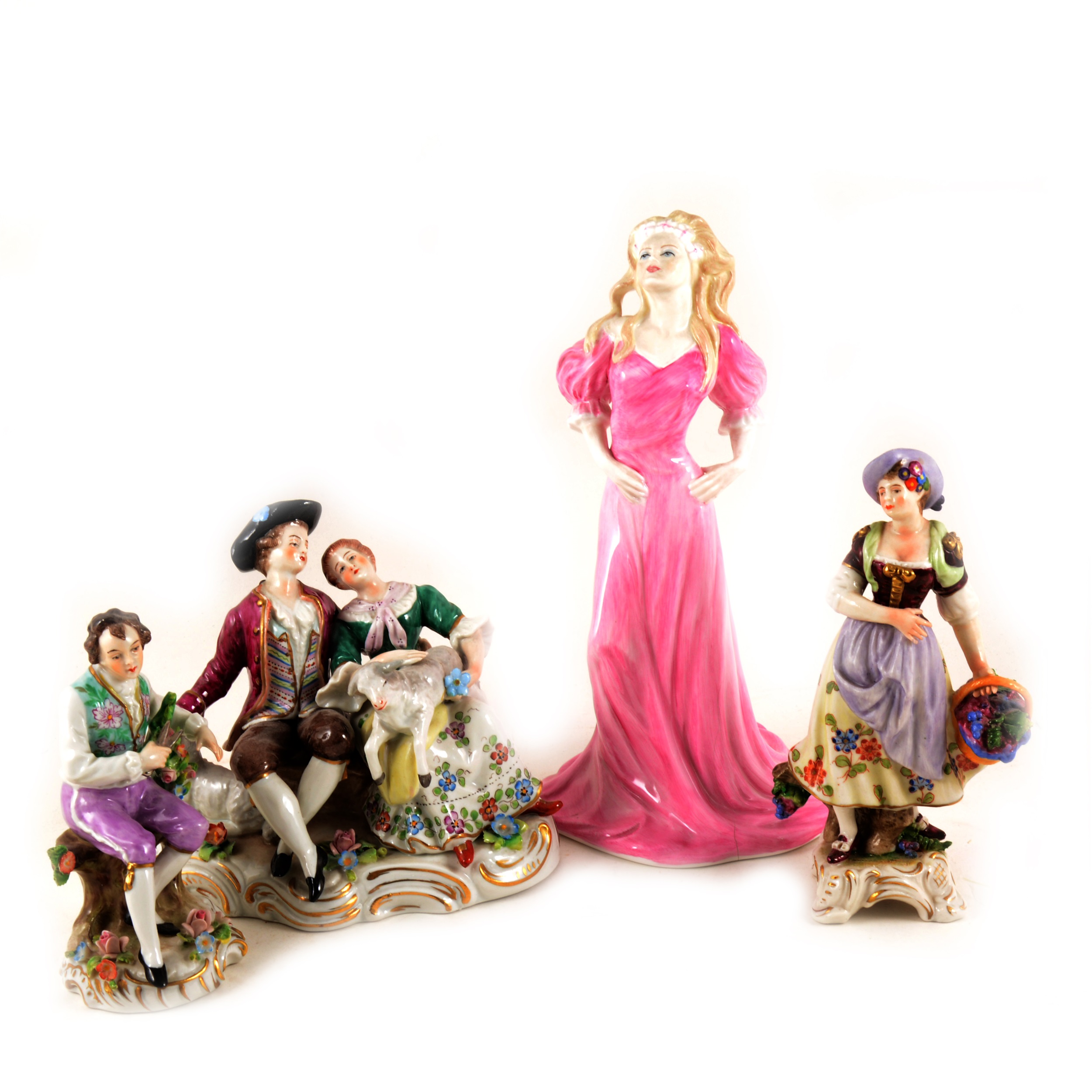 A collection of ceramics, two Wedgwood cherub figures, seven unmarked monkey band figures,