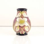 A Moorcroft Pottery vase, ‘White Christmas Rose’ design by Kerry Goodwin