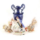 A Capodimonte cockerel and another similar marked "Made in GDR", a Sitzendorf group of dancers,