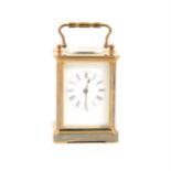 Small French brass cased carriage clock, white enamelled dial, platform escapement, 11cm.