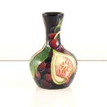 A Moorcroft Pottery vase, ‘Queens Choice’ designed by Emma Bossons.