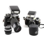 Collection of Olympus SLR cameras, lenses and accessories.