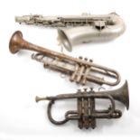 A trumpet, cornet, and alto saxophone, with various mutes.