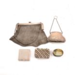 A silver chain mail dance purse, import marks for London 1917, another purse in the shape of