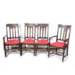 Set of six 1920s oak slat-back dining chairs.