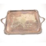 An electroplated rectangular tray, gadroon and shell motif border, 64.5cm width.