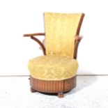 Oak sewing chair, upholstered in gold coloured patterned brocade.