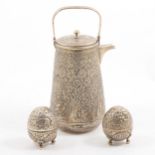 Indian white metal hot water jug, and two white metal egg-shaped cruets