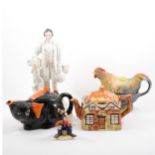 Five novelty teapots, three Staffordshire figures, Beswick Goofy figure, etc.