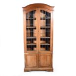 Edwardian oak glazed bookcase.