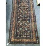 Persian pattern runner, reduced, worn.