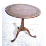 George III oak tripod table.