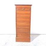 Oak and stained wood tambour front filing cabinet.