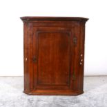 George III oak hanging corner cupboard