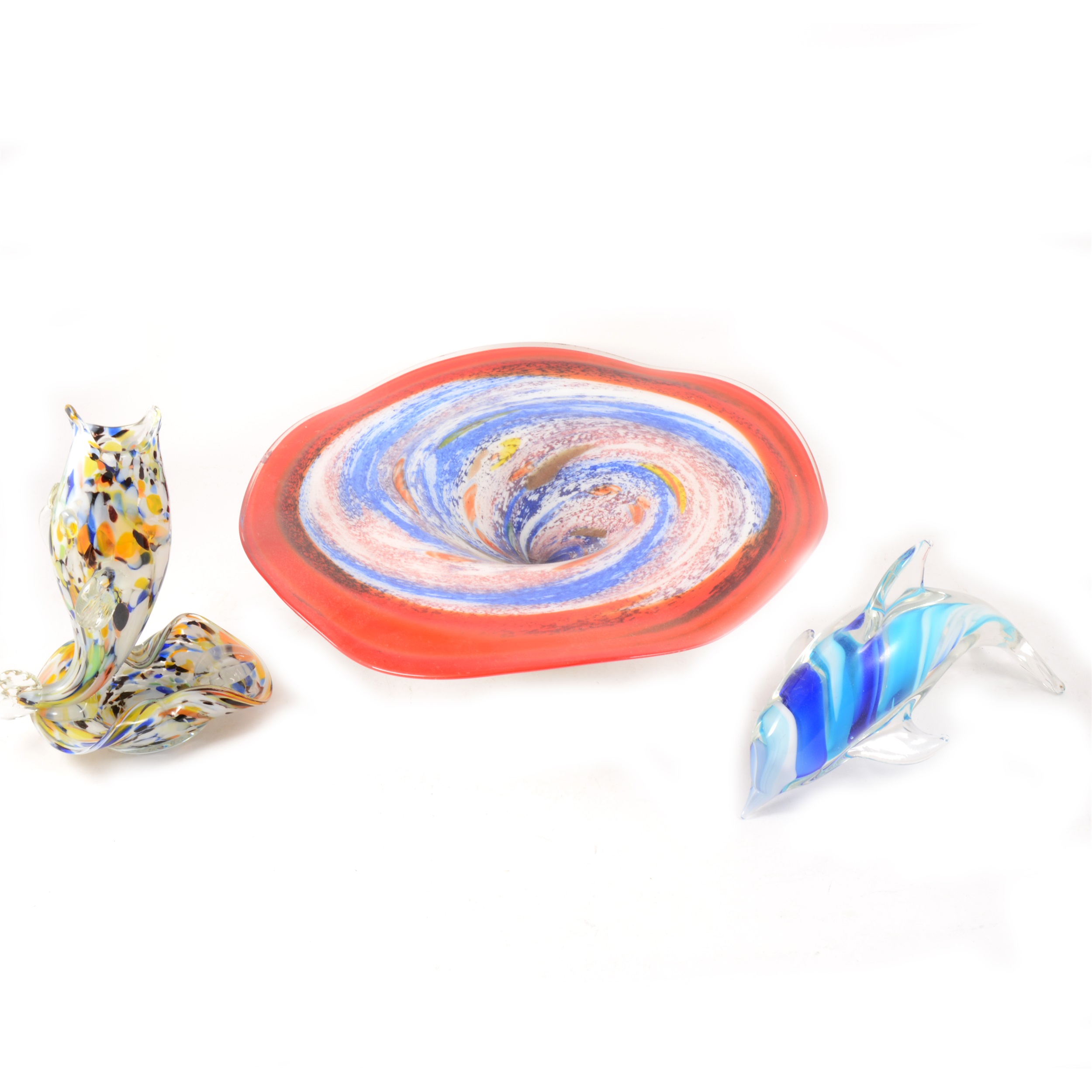 A large art glass circular pedestal dish 38cm diameter, Murano style glass fish, and a dolphin, (3)