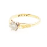 A diamond solitaire ring,