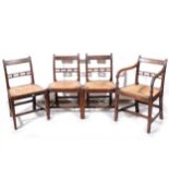 Four Victorian oak bar-back dining chairs,