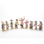 Eight Dresden monkey band figures, early 20th Century