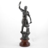 A patinated spelter sculpture of a Blacksmith, early 20th Century.