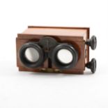 A Unis - France Stereoscope in small mahogany case, 13cm and large collection of slides