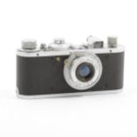 A Leica Standard model E camera, circa 1937, with Leitz Elmar 1:35 F/50mm lens