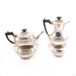 A four piece Scottish silver tea set by Hamilton and Inches