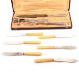 A set of twelve silver fish knives and forks by Mappin & Webb Ltd, plus a cased French